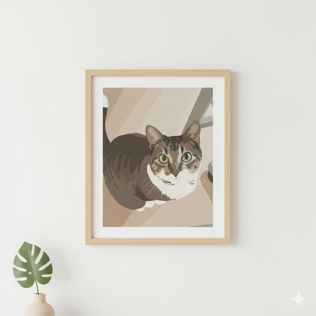 Framed artwork of a cat on a white wall with a plant below.