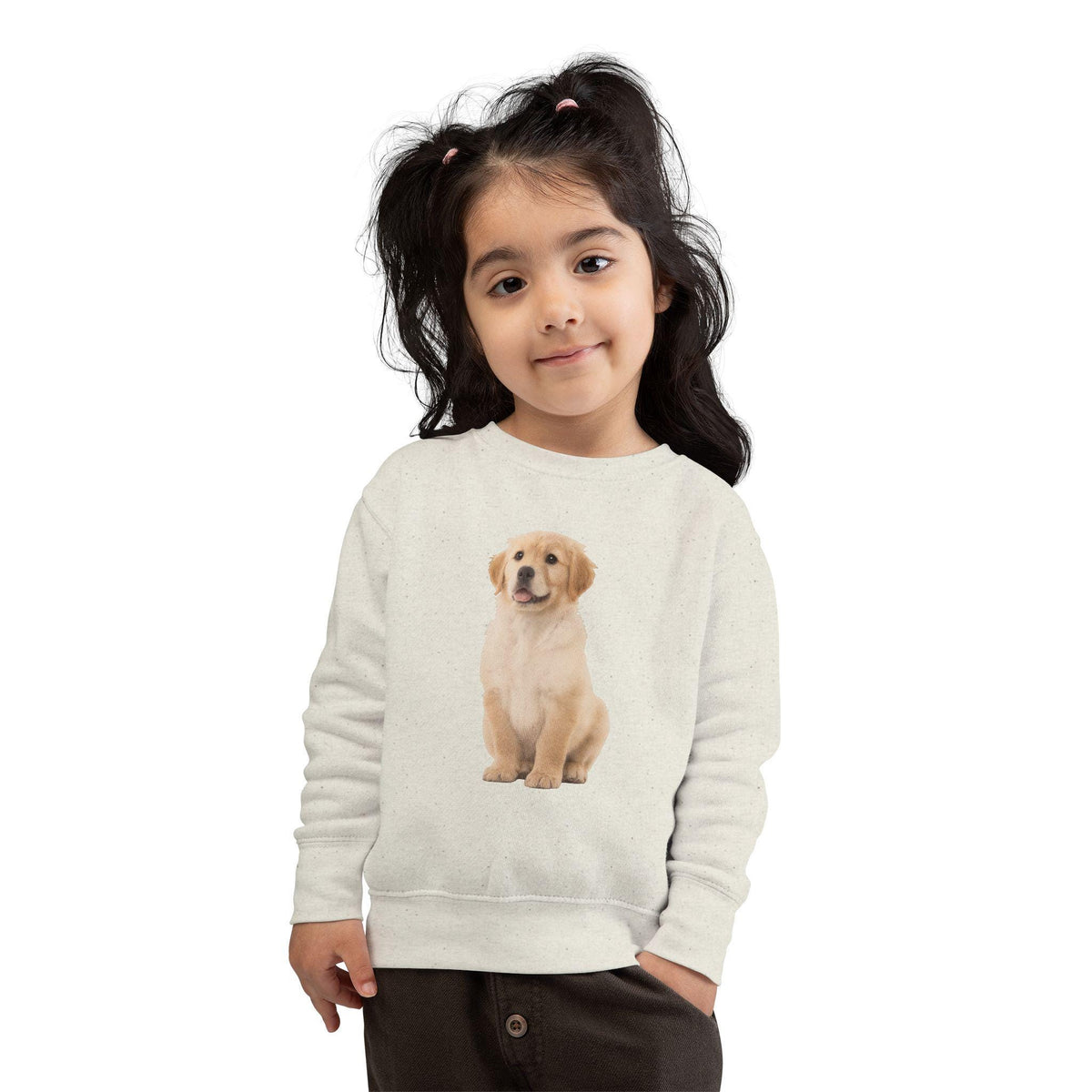 Child wearing a sweatshirt with a puppy graphic on a white background