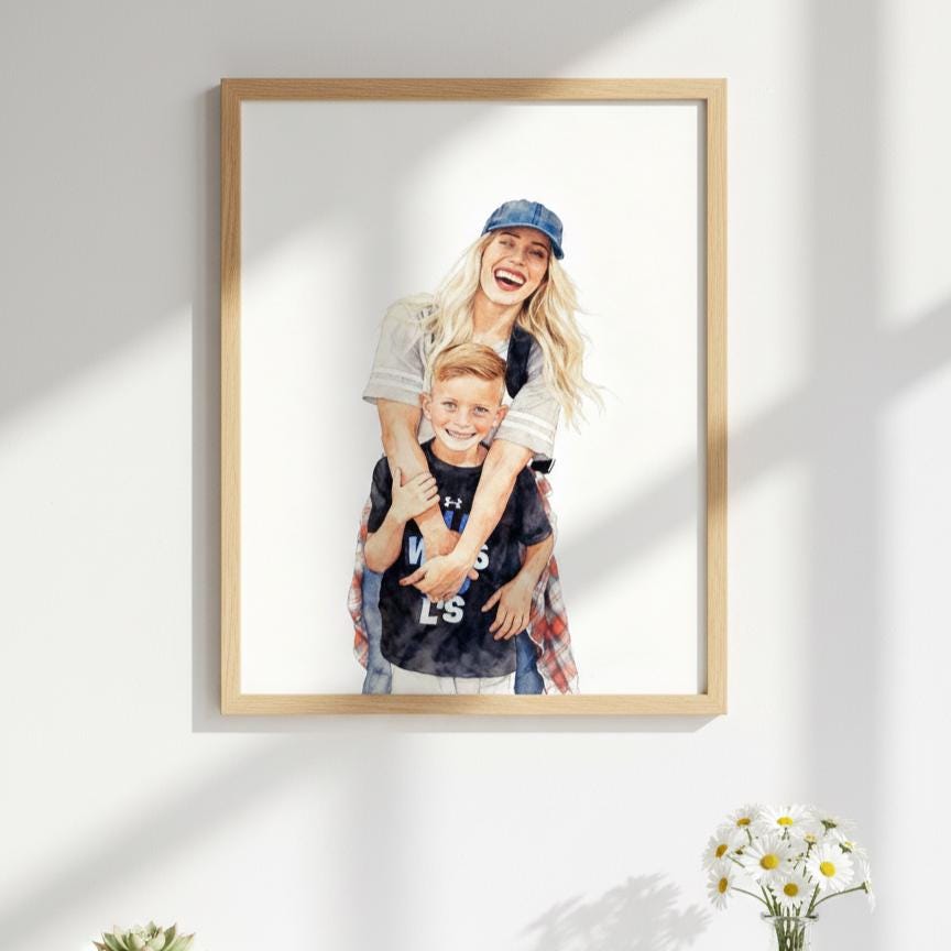 Framed photograph of a woman and a child on a white wall with a vase of flowers in the corner.