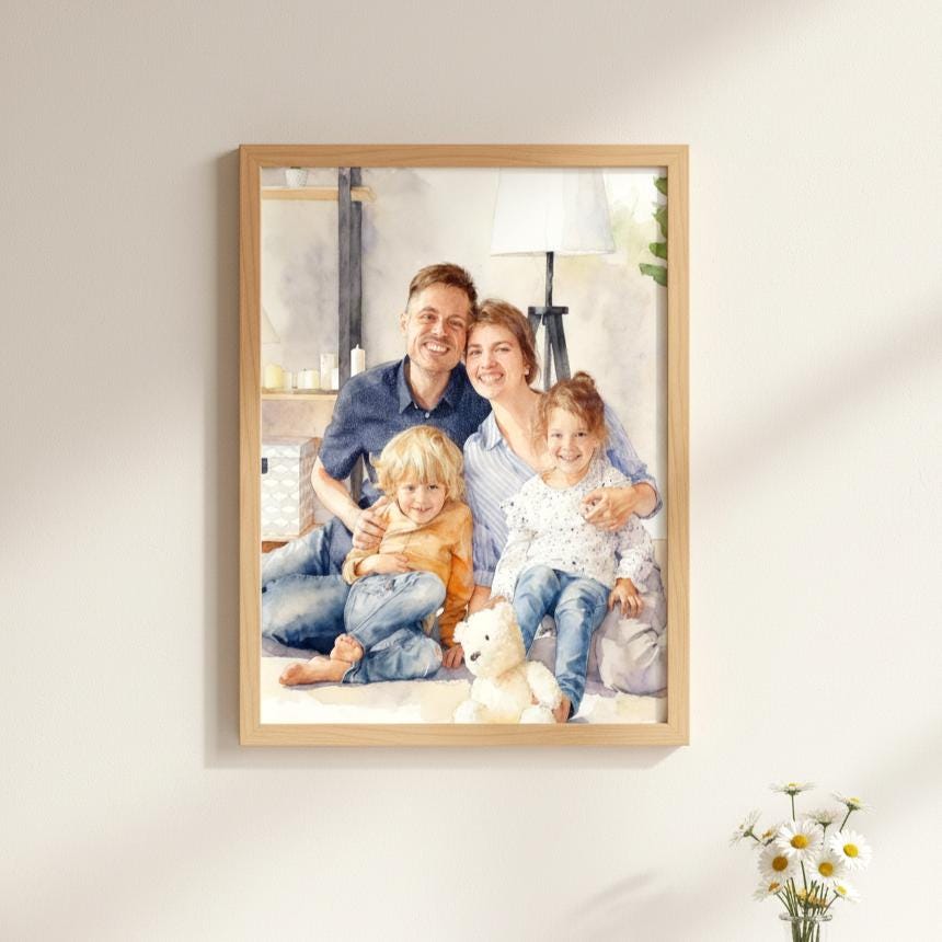 Framed family photo on a wall with a vase of flowers in the corner