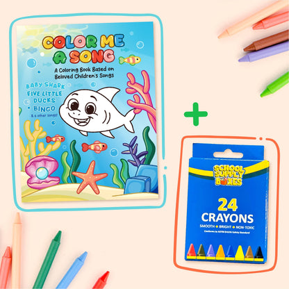 Coloring book titled 'Color Me a Song' with a shark design, surrounded by crayons on a light background.