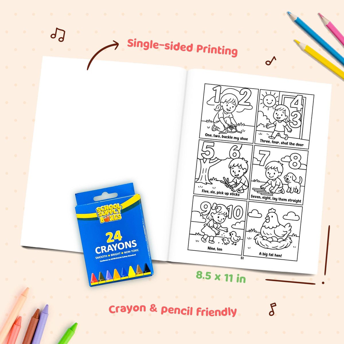 Coloring book with cartoon pages and a box of crayons on a beige background