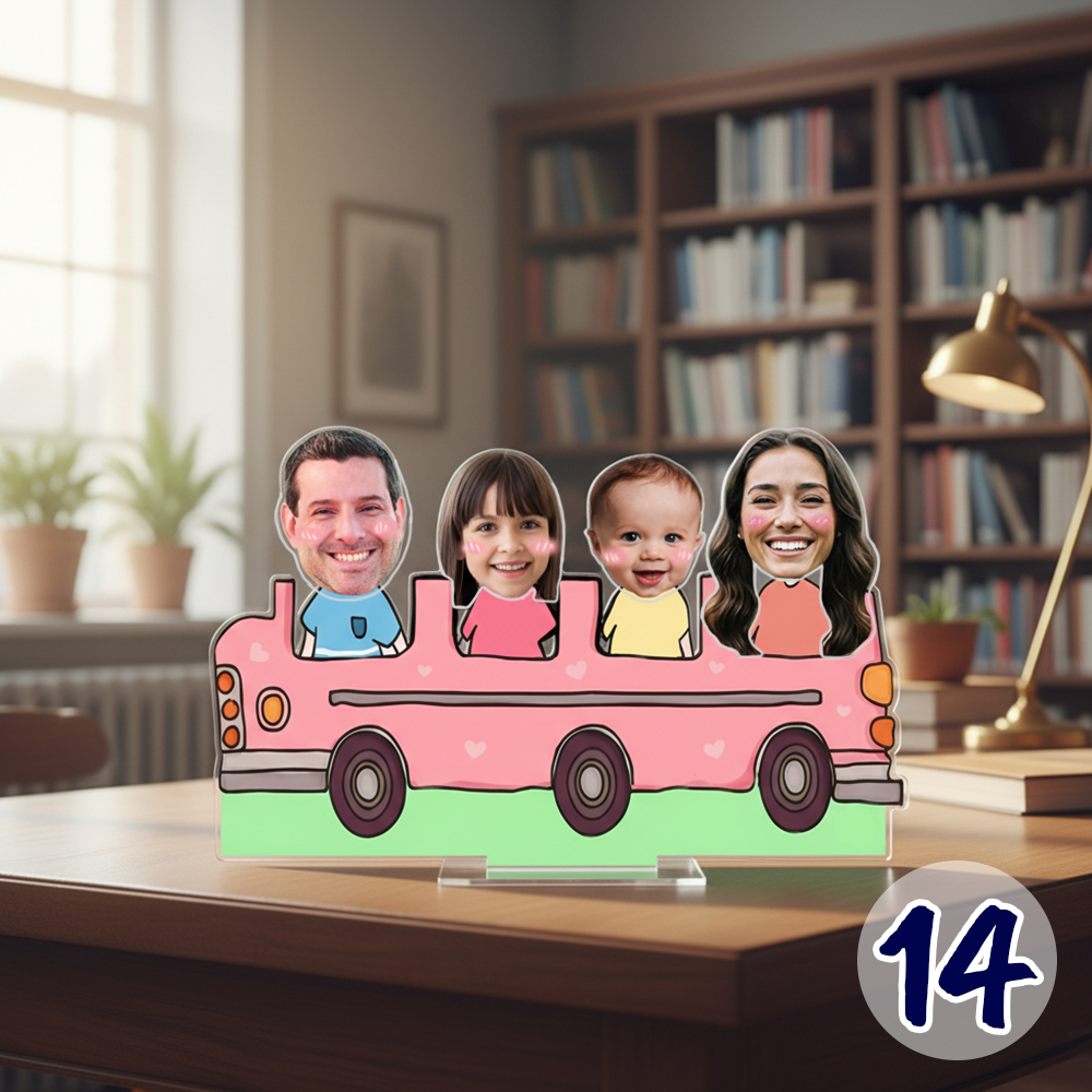 Personalized family bobblehead standee with custom faces riding a cute cartoon bus on acrylic base