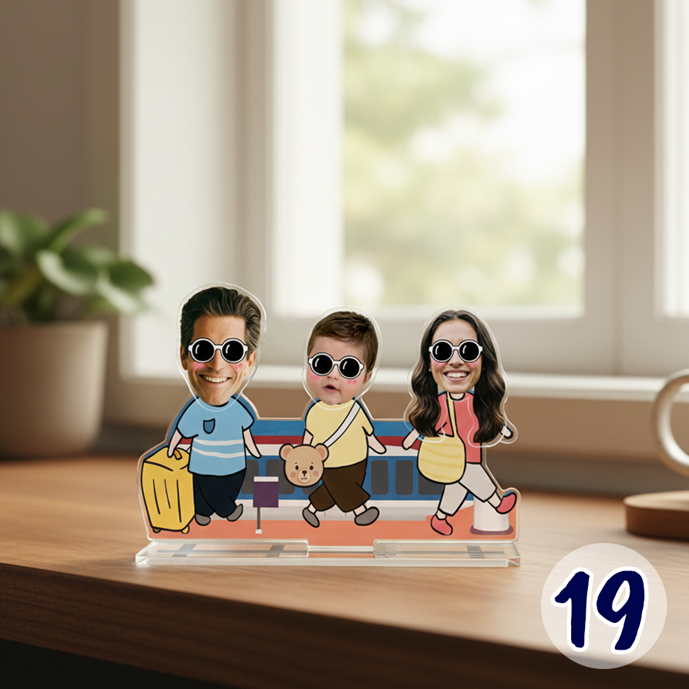 Personalized family bobblehead standee with custom faces in a cute travel-themed cartoon design on acrylic base