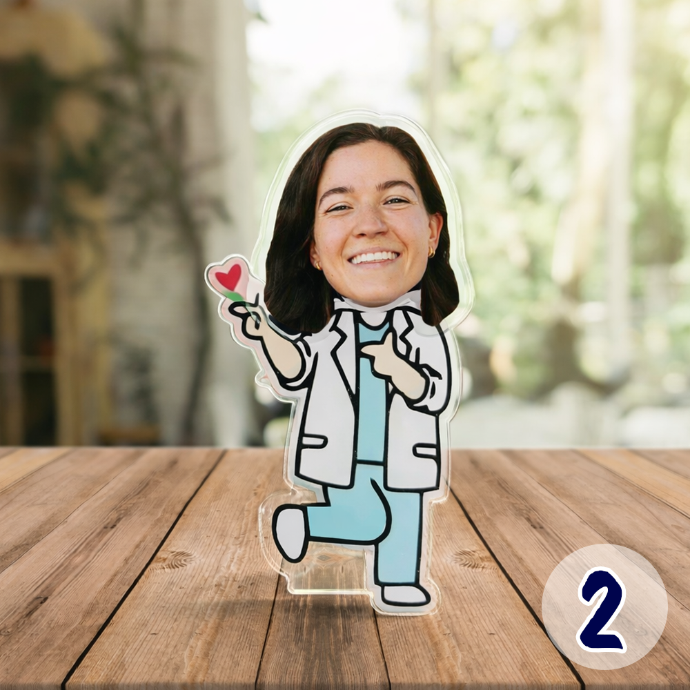 Custom face doctor acrylic standee with playful pose, personalized cartoon doctor figure holding a heart, made from customer photo as a thoughtful medical gift