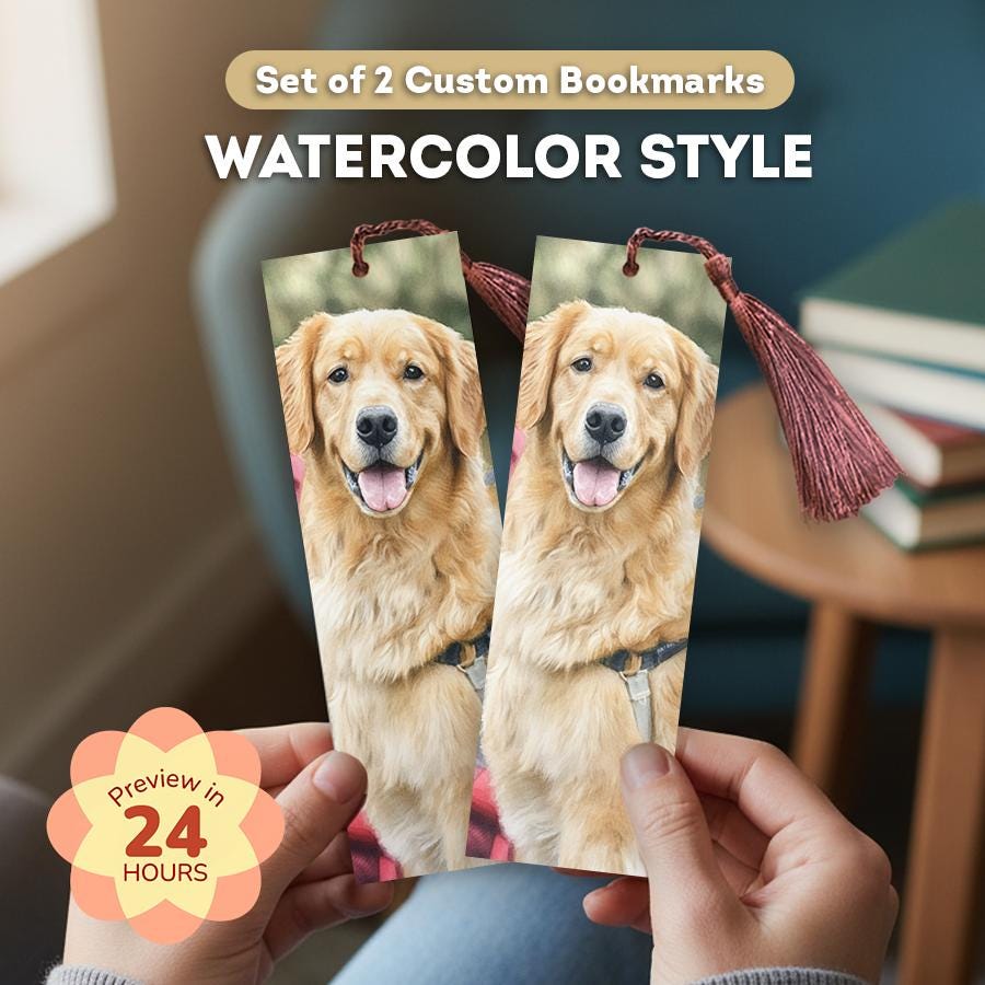 Two watercolor-style bookmarks with a dog on them held by hands, with books in the background.