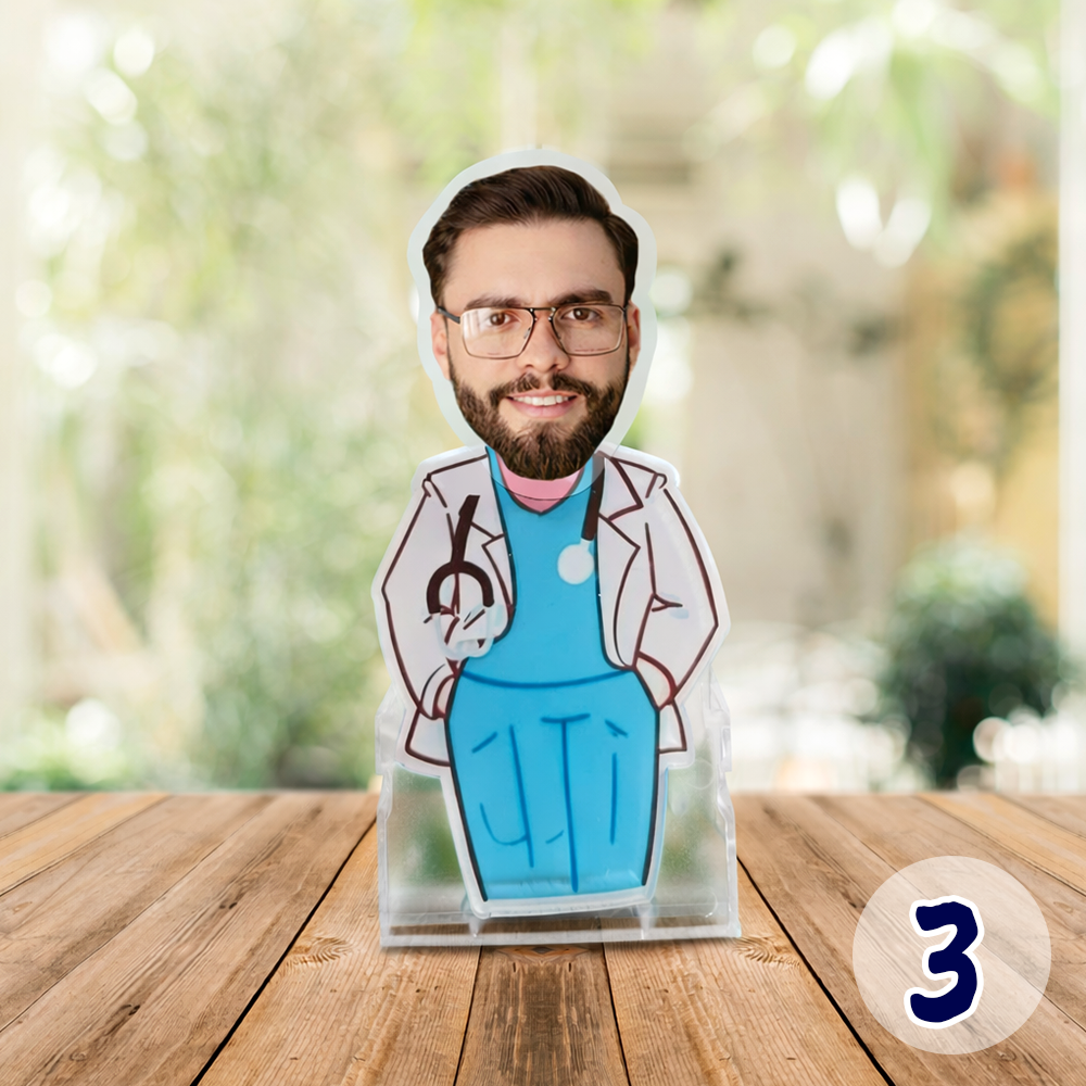 Personalized male doctor acrylic standee made from customer photo, featuring a custom cartoon doctor figure with lab coat and stethoscope as a unique medical desk gift