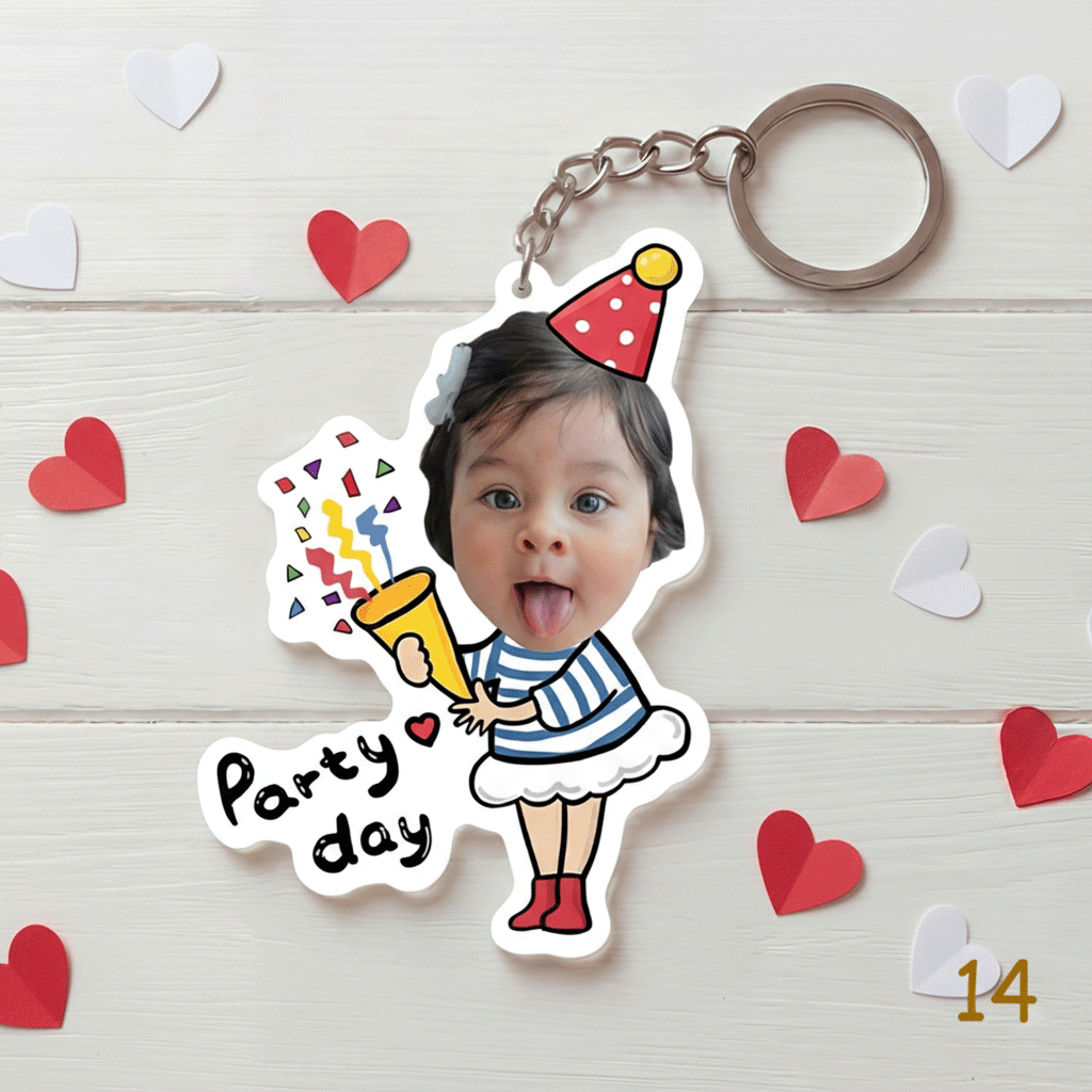 Keychain with a child's photo and 'Party day' text, surrounded by heart decorations on a light wooden background.