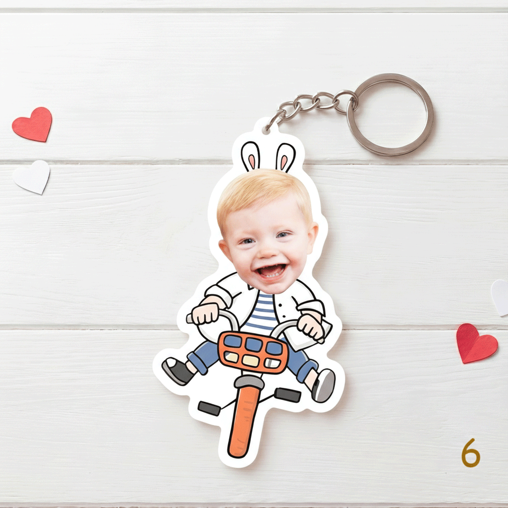 Keychain with a child's photo on a white wooden background