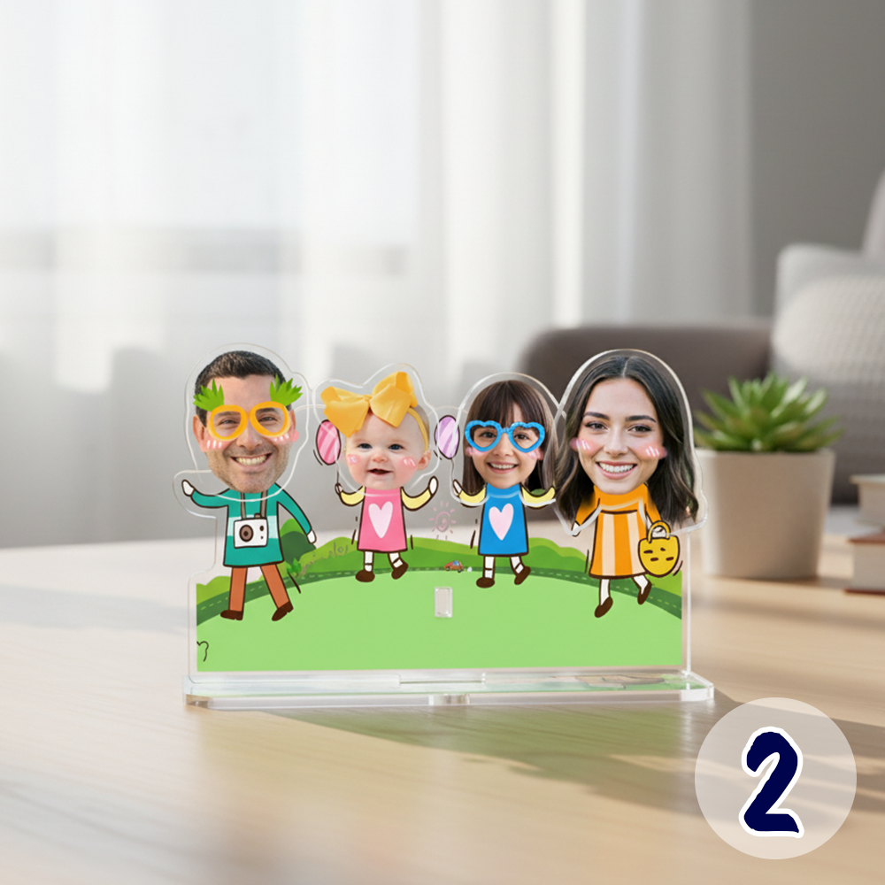 Personalized family bobblehead standee with custom faces on a clear acrylic base