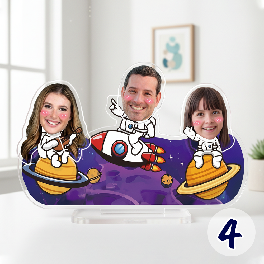 Custom family bobblehead standee featuring personalized faces in a cute astronaut space design on acrylic base