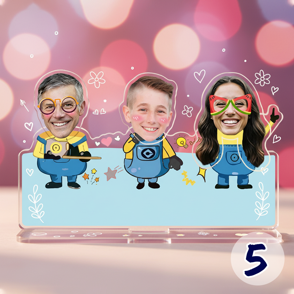 Personalized family bobblehead standee with custom faces in a fun Minion-inspired cartoon design on acrylic base