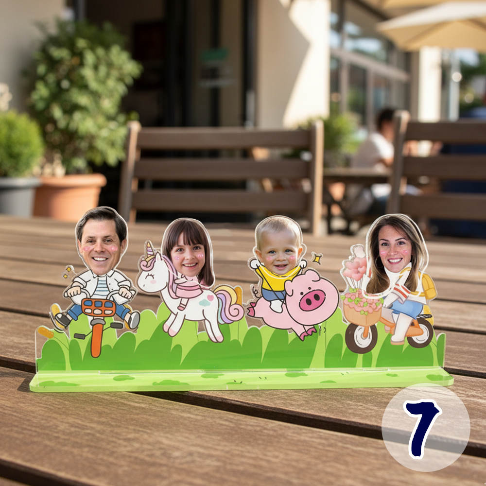 Personalized family bobblehead standee with custom faces in a playful cartoon outdoor theme on acrylic base