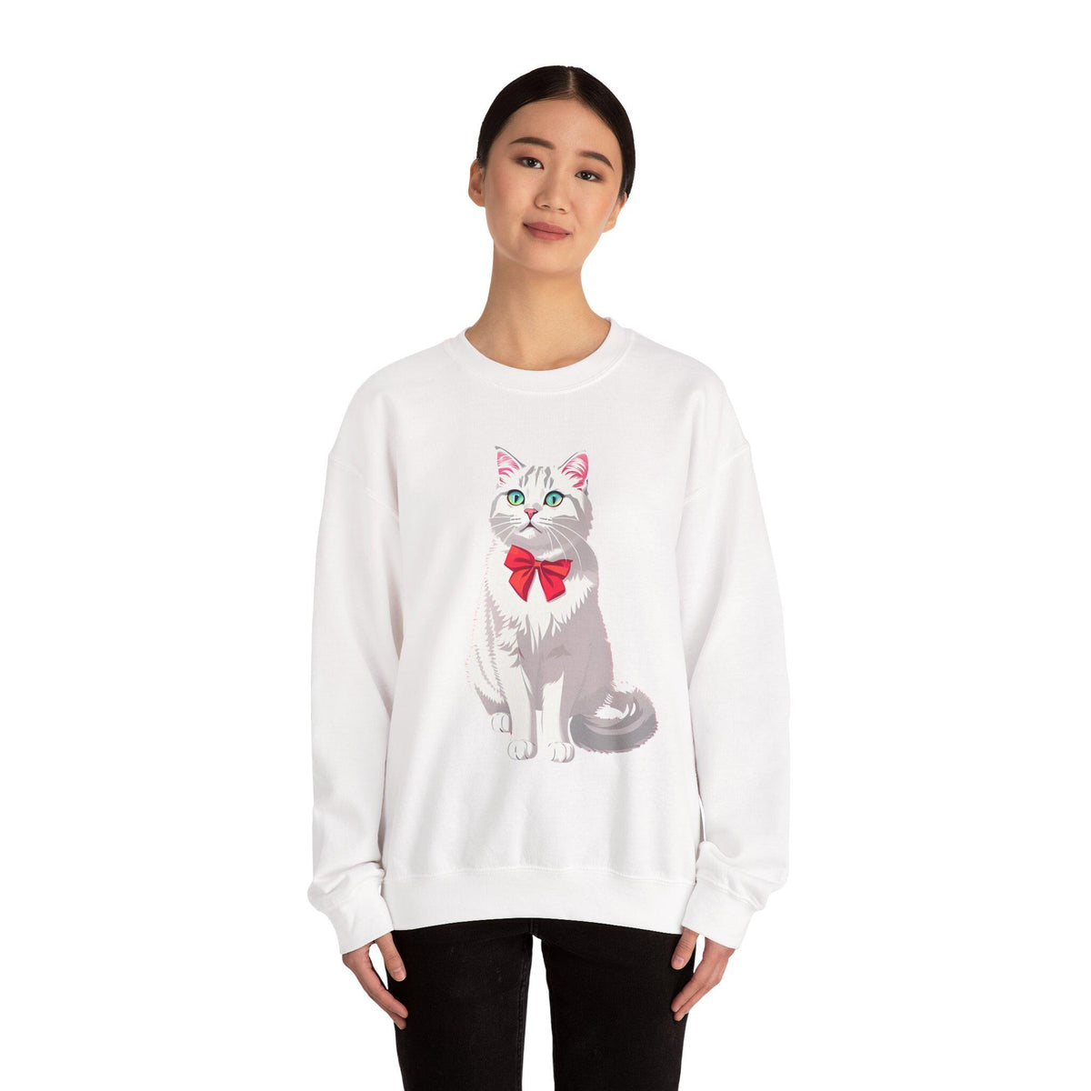 Person wearing a white sweatshirt with a cat graphic on a white background