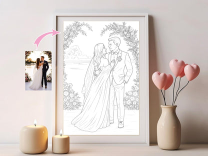 Framed line drawing of a couple with a photo of the same couple in the corner, surrounded by candles and a vase with pink hearts.