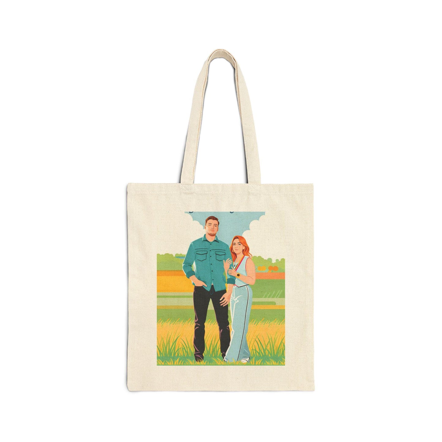 Tote bag with a printed design of a couple in a field on a white background