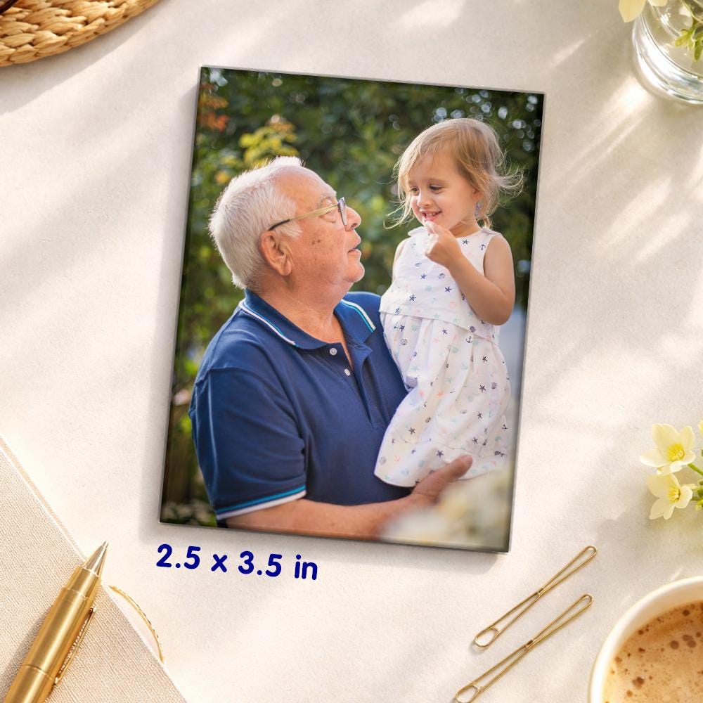 Personalized 2.5x3.5 inch photo vinyl magnet showing a grandfather holding his granddaughter.