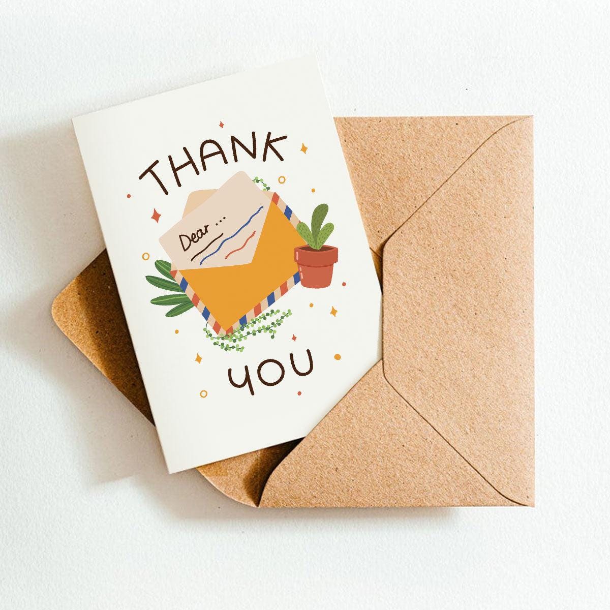 Greeting card with 'Thank you' message and envelope on a white background
