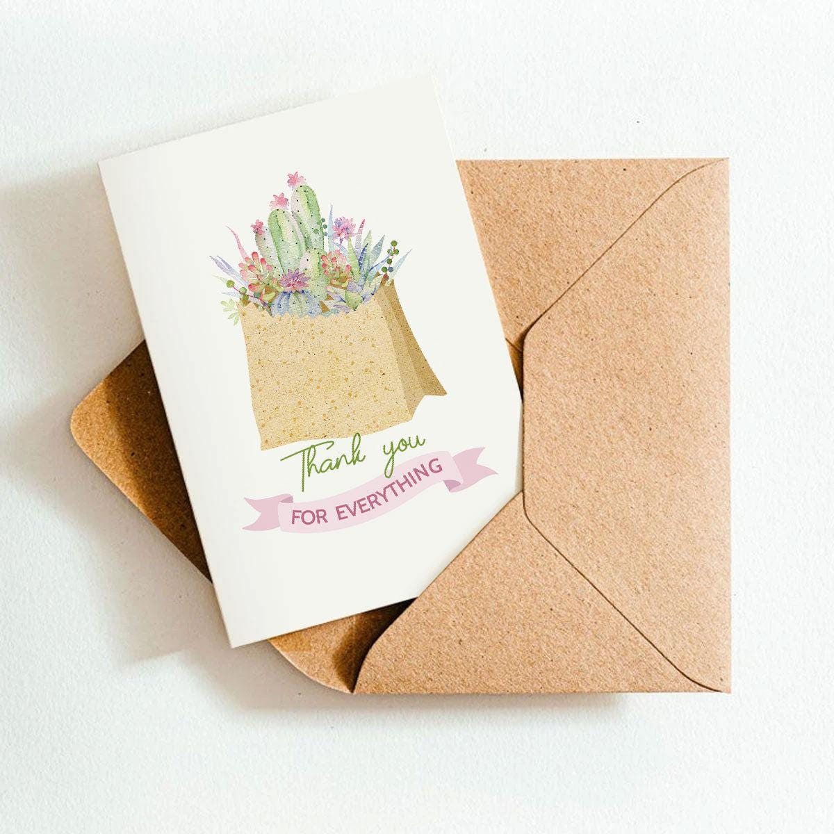 Greeting card with cactus illustration and 'Thank you for everything' text, accompanied by a brown envelope on a white background.